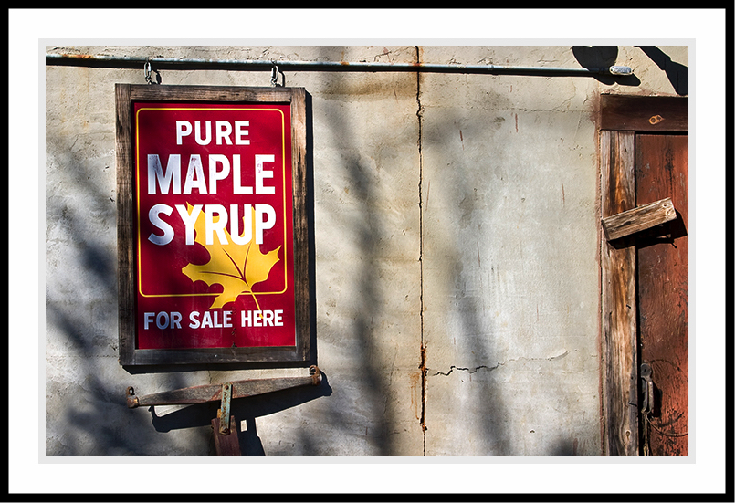 Maple Syrup sign on wall.